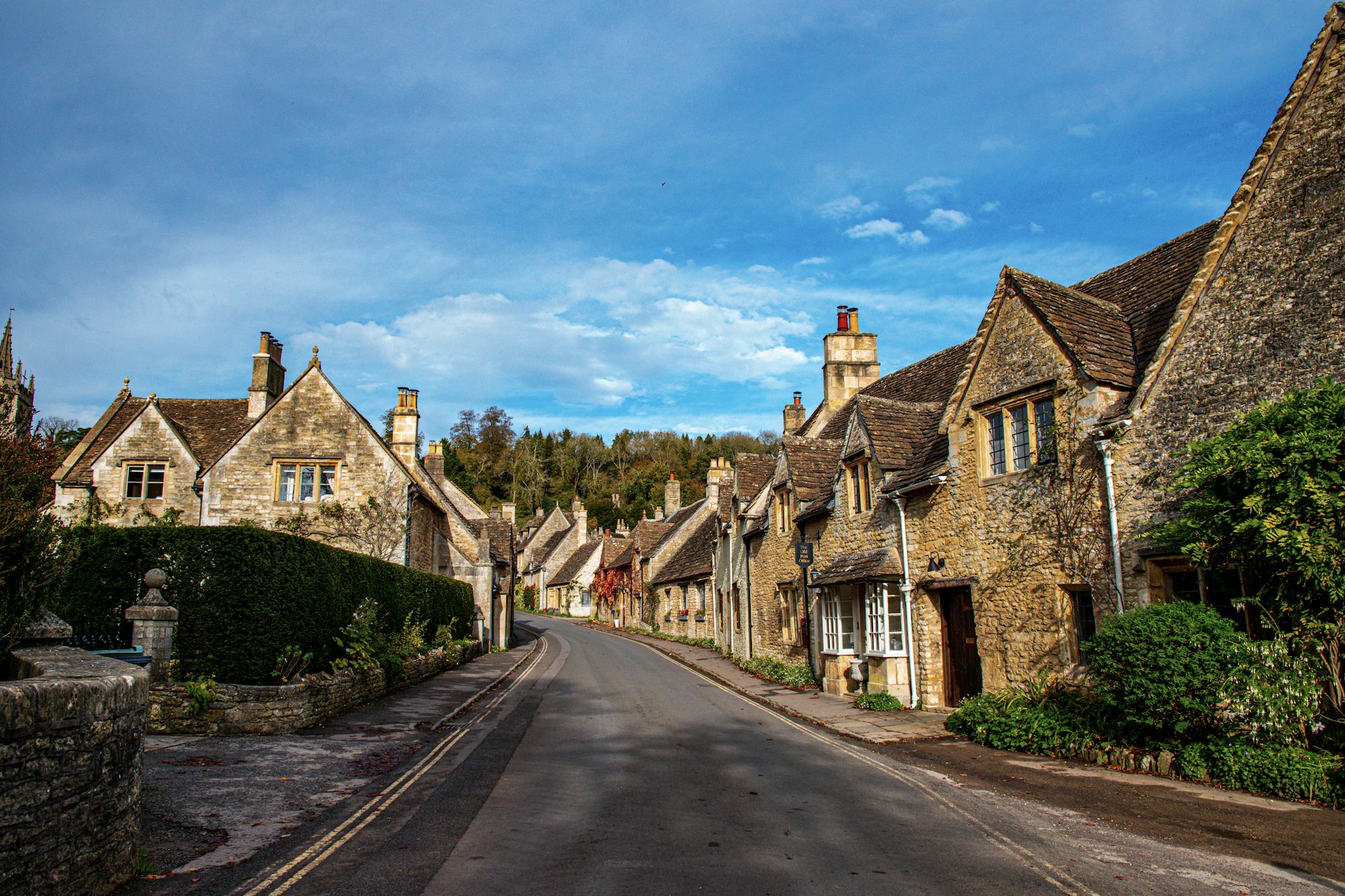 Stone cottages along a village street in the English countryside